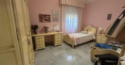 CASA CON COCHERA