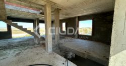 Terreno urbano en Martín Miguel con construcción a terminar