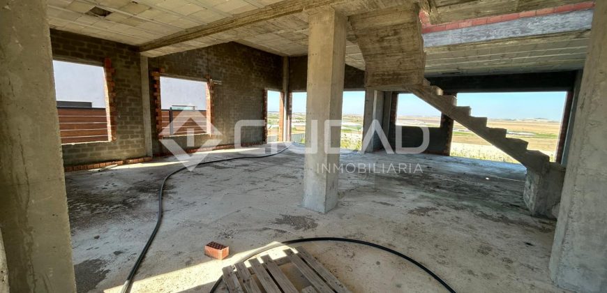 Terreno urbano en Martín Miguel con construcción a terminar