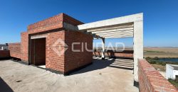 Terreno urbano en Martín Miguel con construcción a terminar