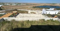 Terreno urbano en Martín Miguel con construcción a terminar