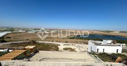 Terreno urbano en Martín Miguel con construcción a terminar