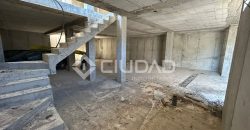 Terreno urbano en Martín Miguel con construcción a terminar