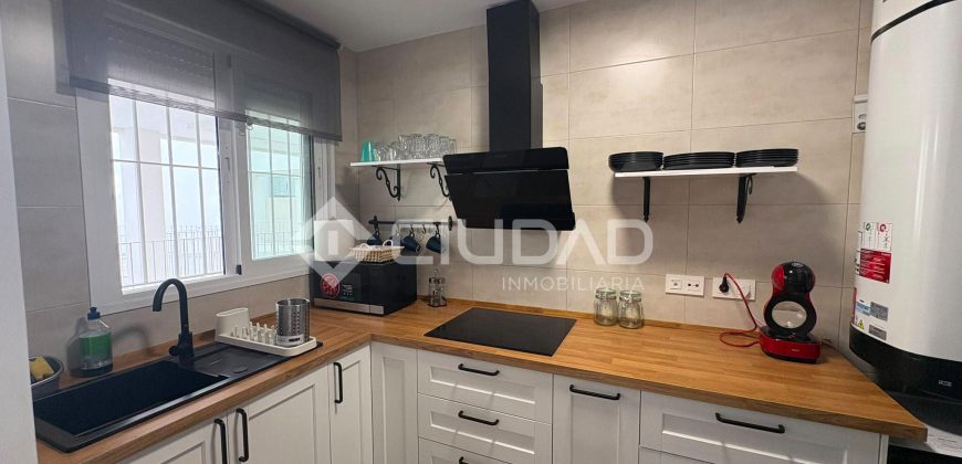 Piso con PATIO Y GARAJE de reciente construcción