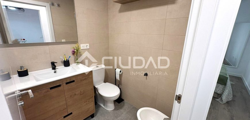 Piso con PATIO Y GARAJE de reciente construcción