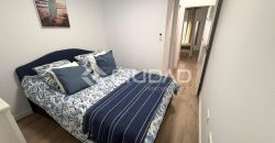 Piso con PATIO Y GARAJE de reciente construcción