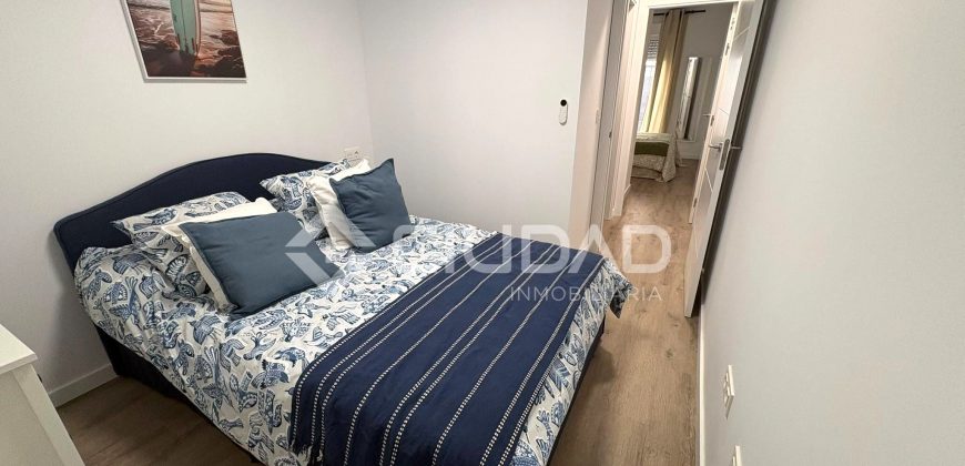 Piso con PATIO Y GARAJE de reciente construcción