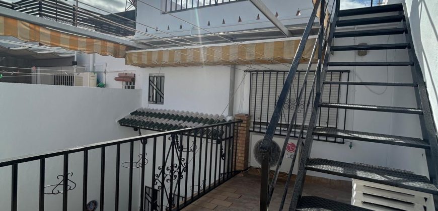 CASA ADOSADA