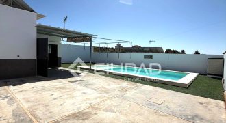 Parcela con construcción y piscina en Reventón Chico