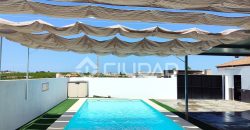 Parcela con construcción y piscina en Reventón Chico